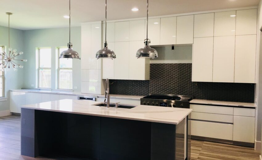 Elegant Light Gray Kitchen With Marble Detailing