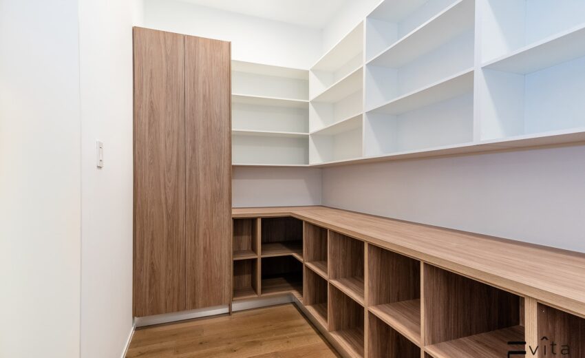 Tailored Two-Tone Custom Closet: Wall-Fitted Design