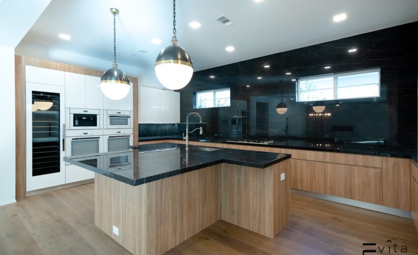 Modern Mocha-Toned Custom Kitchen With Black Marble Countertop