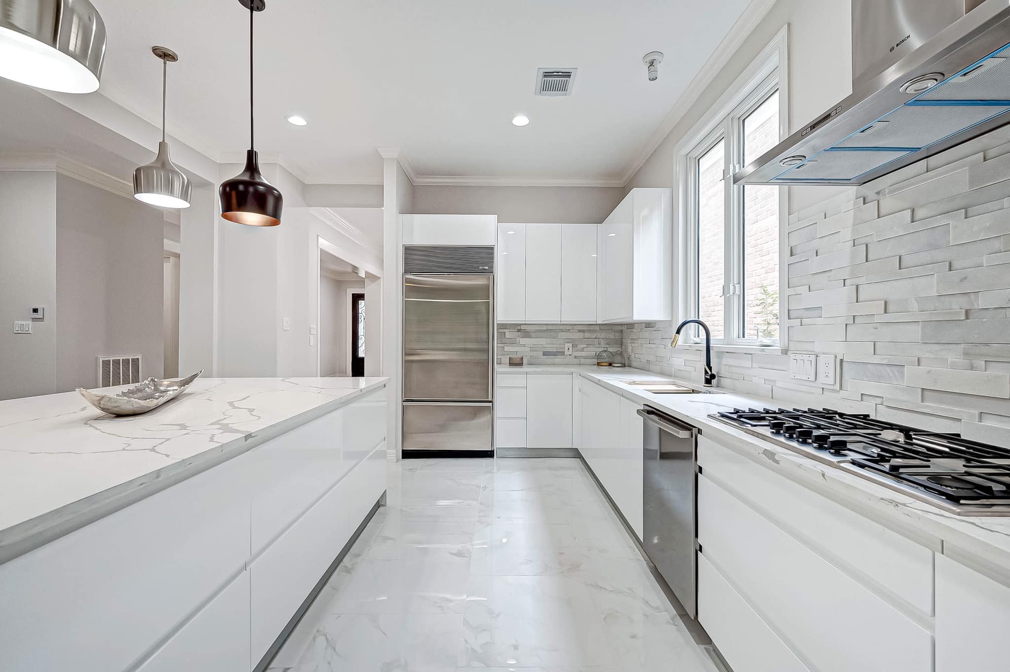 Elegant White Kitchen with Marble Accents
