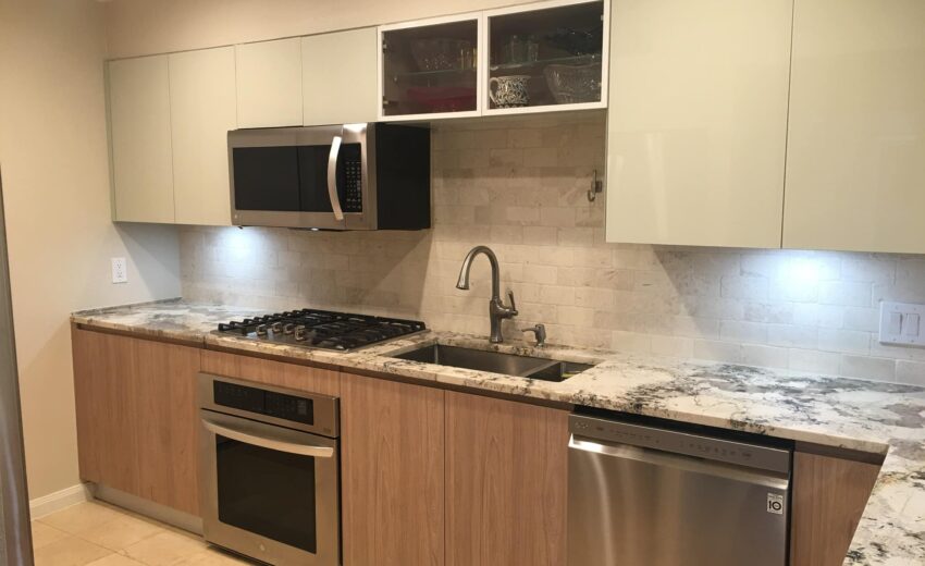 Modern Coffee-Toned Kitchen With Marble-Inspired Countertop