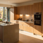 A Warm And Inviting Modern Kitchen Featuring Sleek Custom Cabinets With A Natural Wood Finish, Captured In Houston By A Hasselblad X2D 100C.